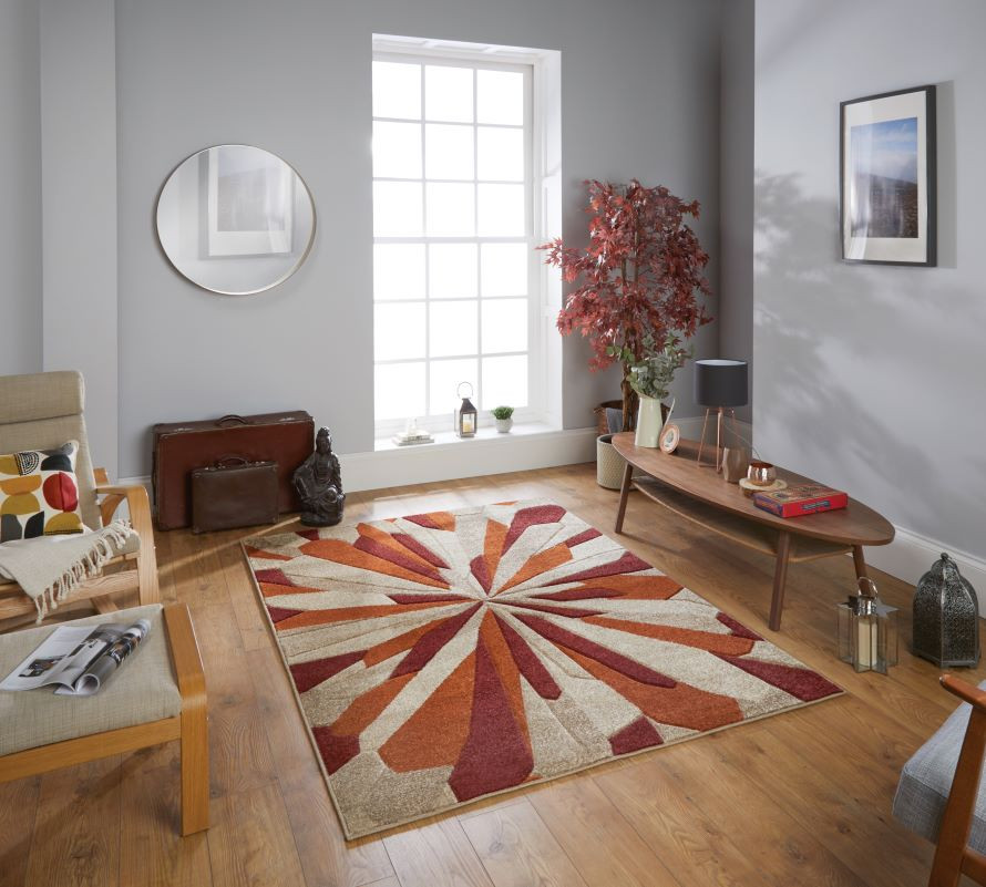 The Portland 3337 E abstract rug features warming autumnal colours and is available to buy from talkrugs